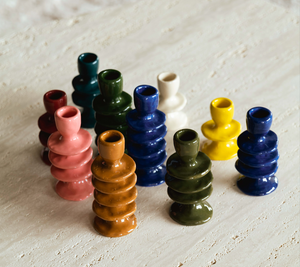 Our most popular candle holder: The pequin. pink blue yellow brown green red white